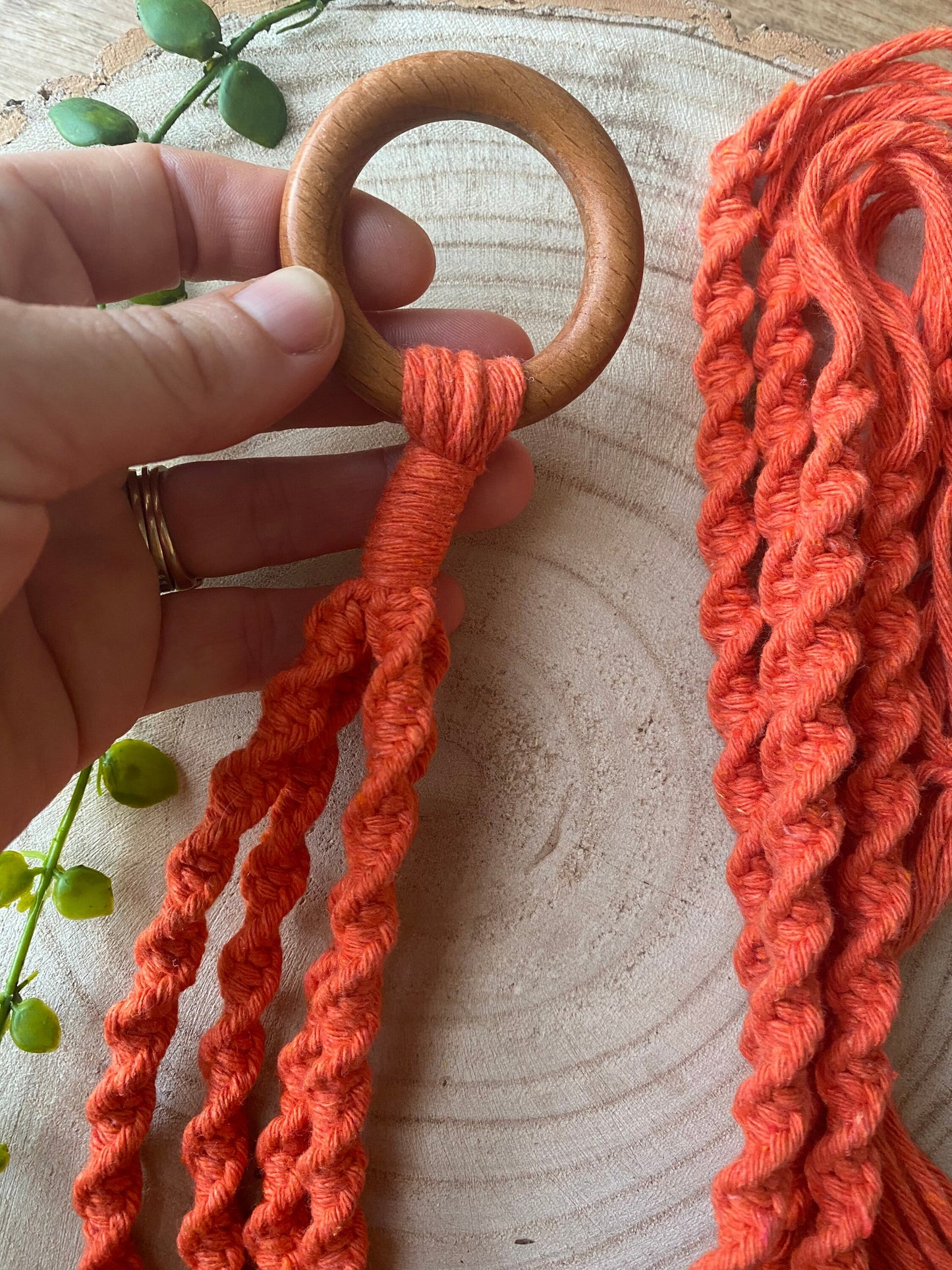 Macra-Made With Love macrame plant hanger orange flat top detail