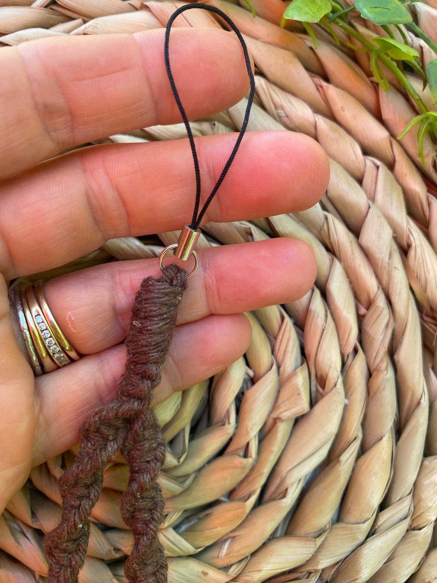 Macra-Made With Love twisted phone charm brown on hand