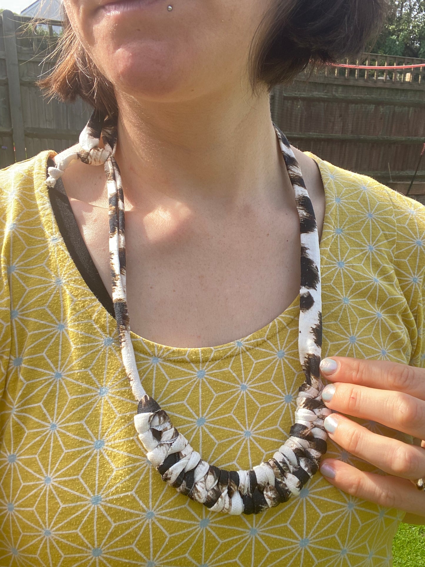 Macra-Made With Love rope necklace animal print worn outside