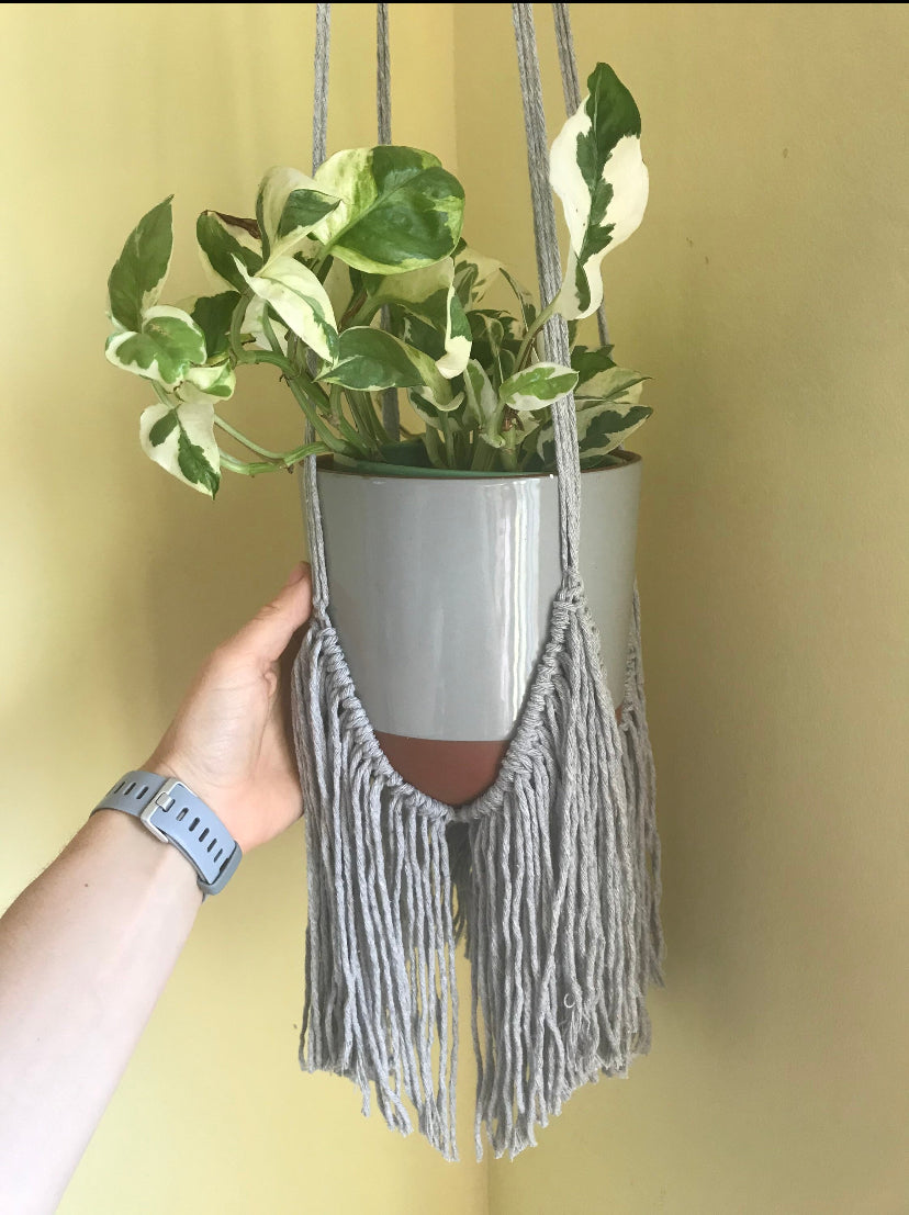 Macra-Made With Love fringed macrame plant hanger grey bottom with hand