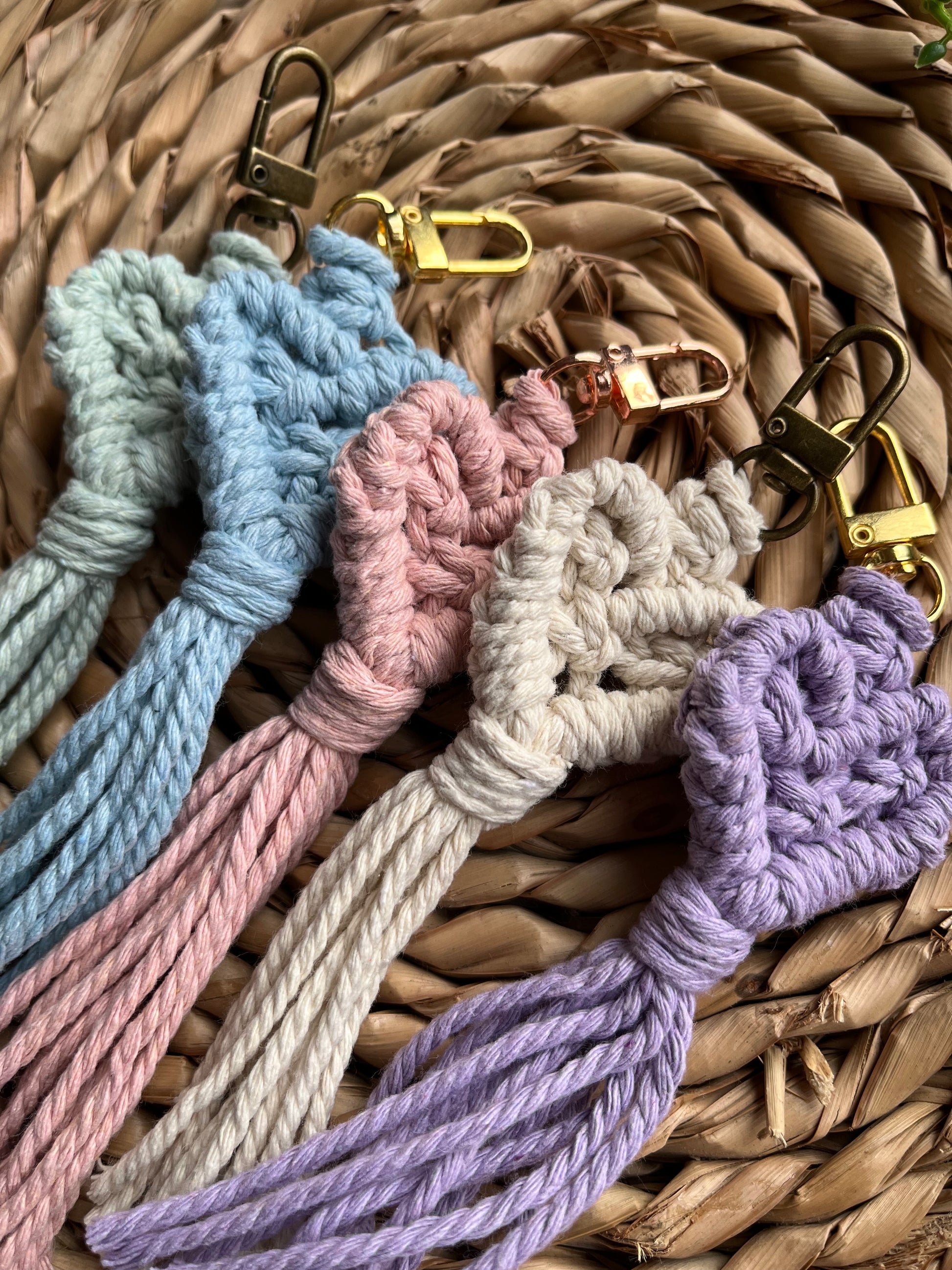 Handmade macrame heart shaped keychains, made with recycled cotton in various pastel shades