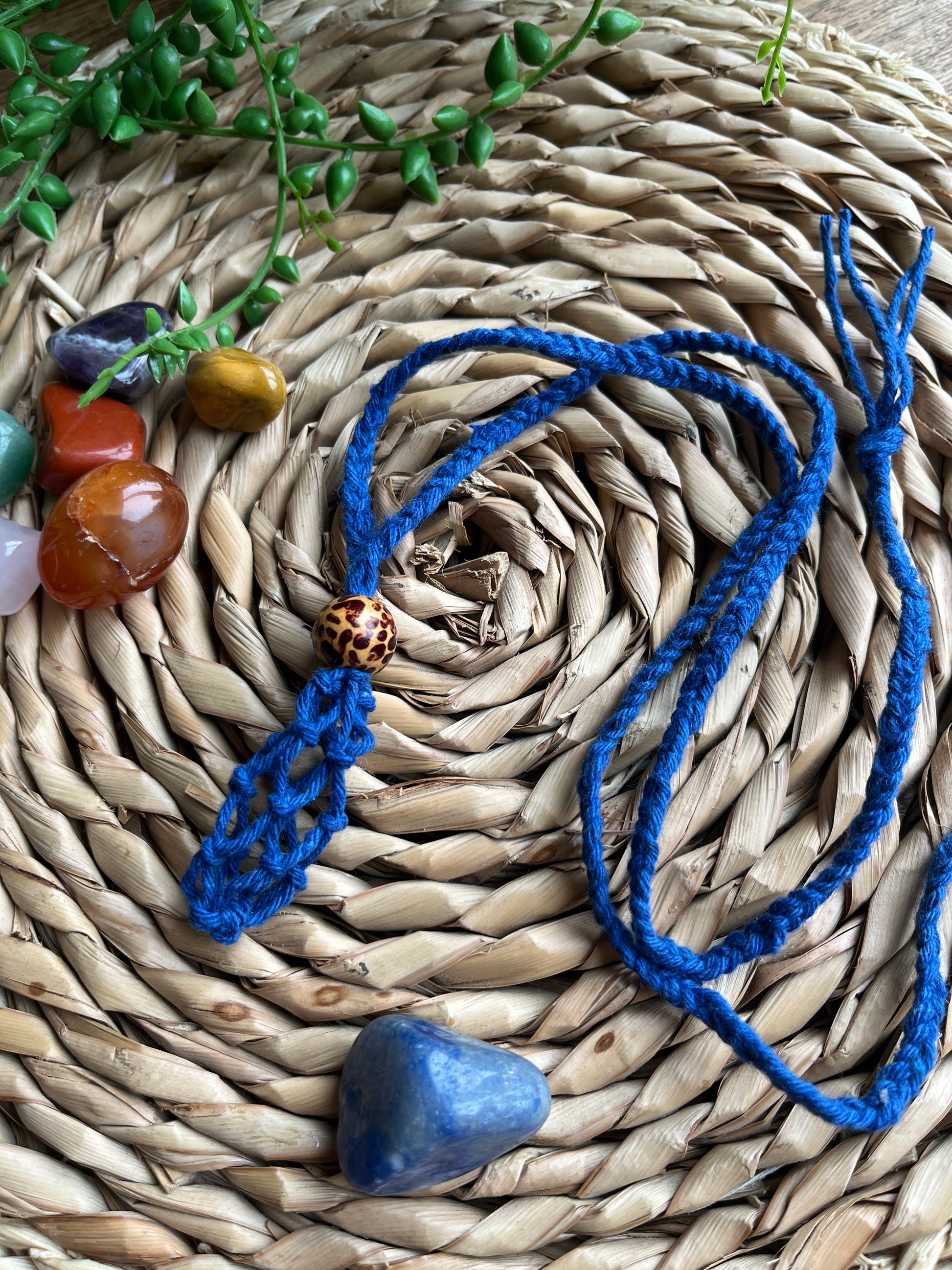Macrame Gemstone Holder empty net pouch made with blue eco friendly recycled cotton and a Wooden bead