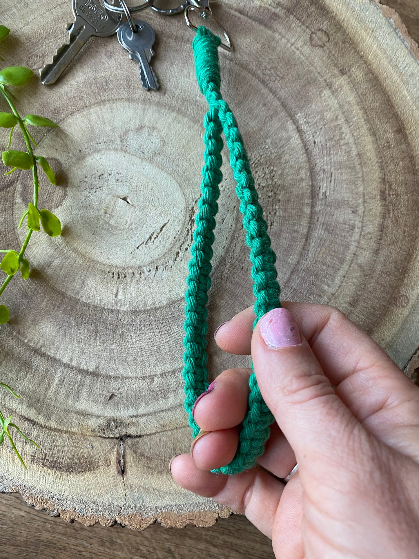 Macra-Made With Love wristlet keychain green in hand