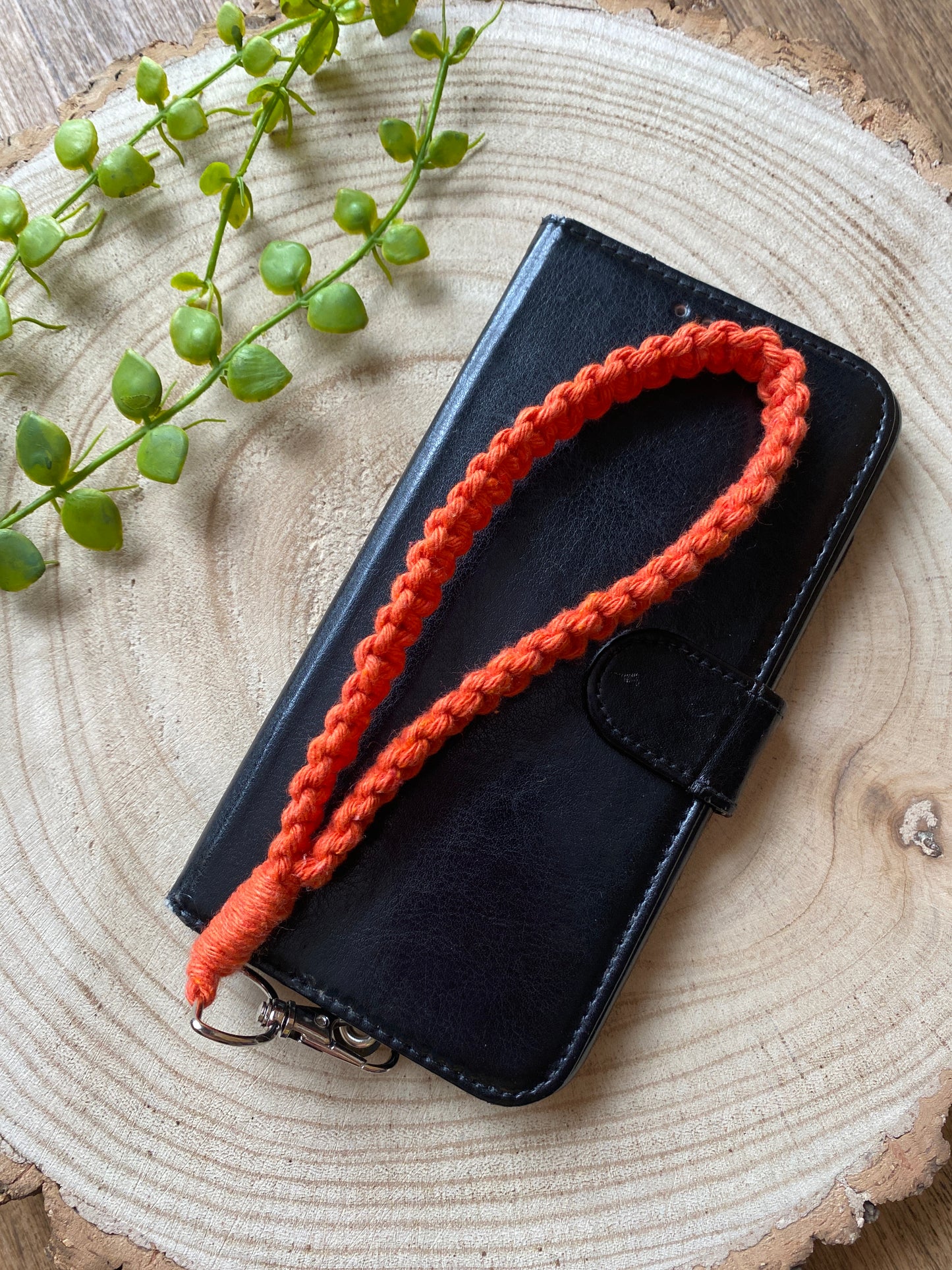 Macra-Made With Love phone wrist strap orange on phone