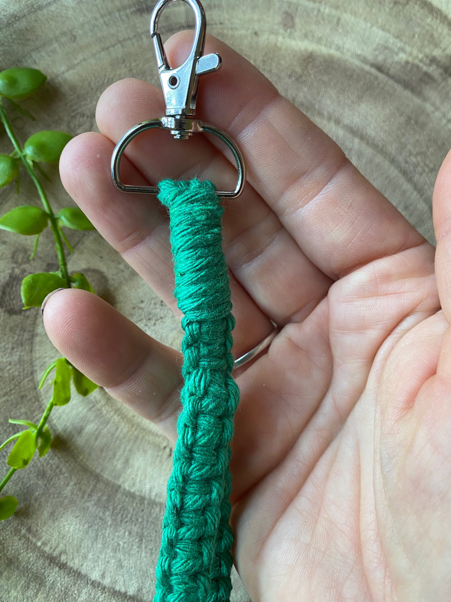 Macra-Made With Love phone wrist strap green in hand