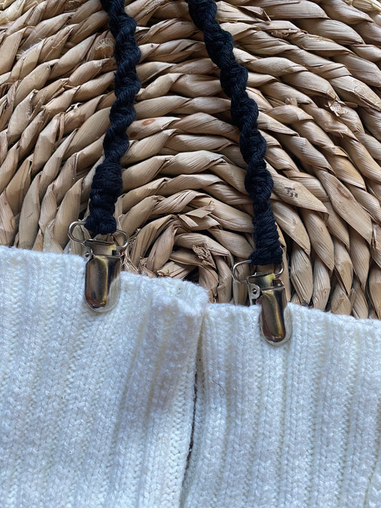 Eco-friendly long mitten clips (190cm) made with black recycled cotton yarn, showing metal clasps attached to white mittens - practical winter accessory