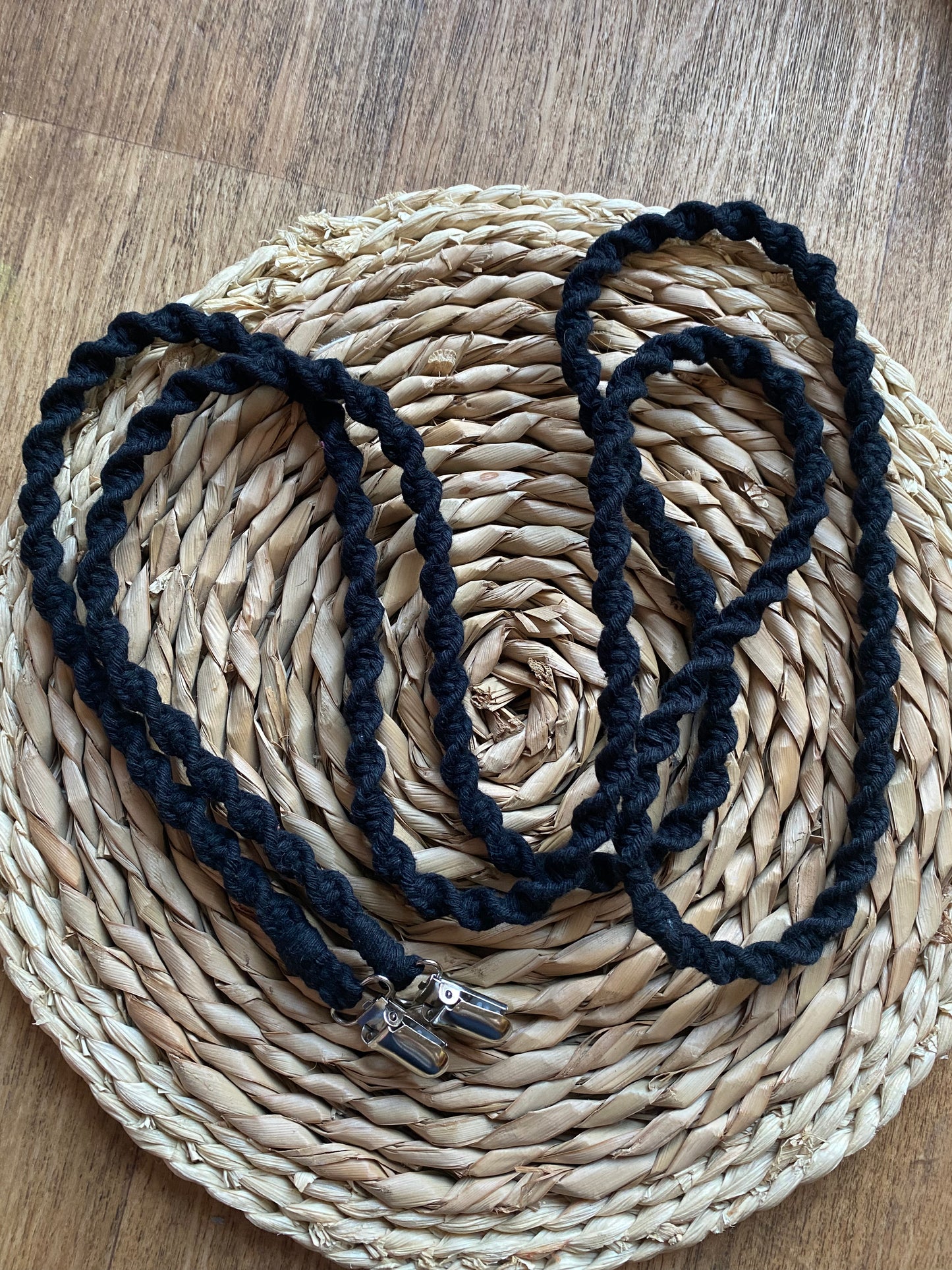 Full-length view of 190cm black eco-friendly long mitten clips laid flat - showing entire handmade sustainable winter accessory