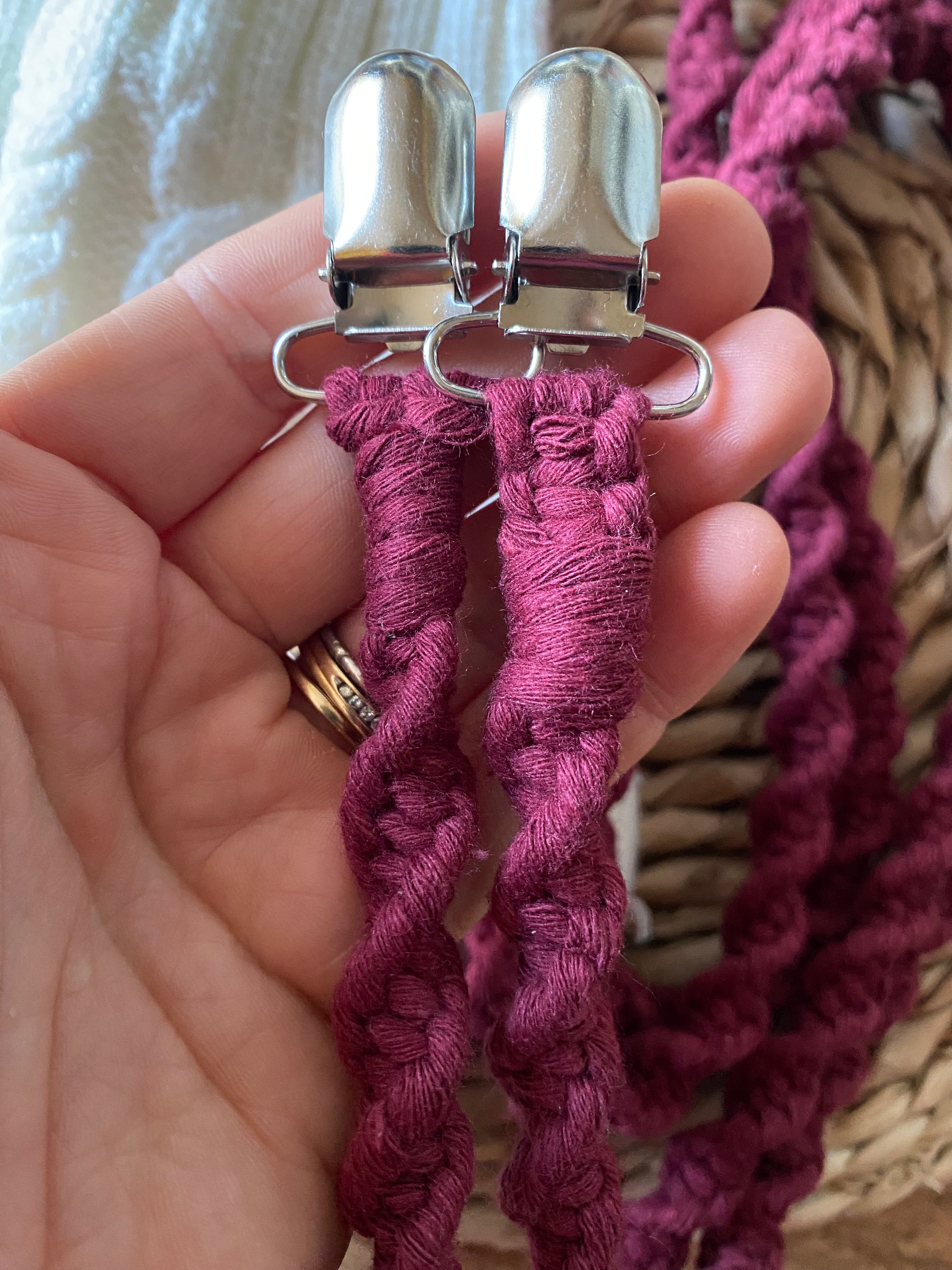 Close-up of secure metal clasps on deep red eco-friendly long mitten clips - handmade with recycled materials by Macra-Made With Love