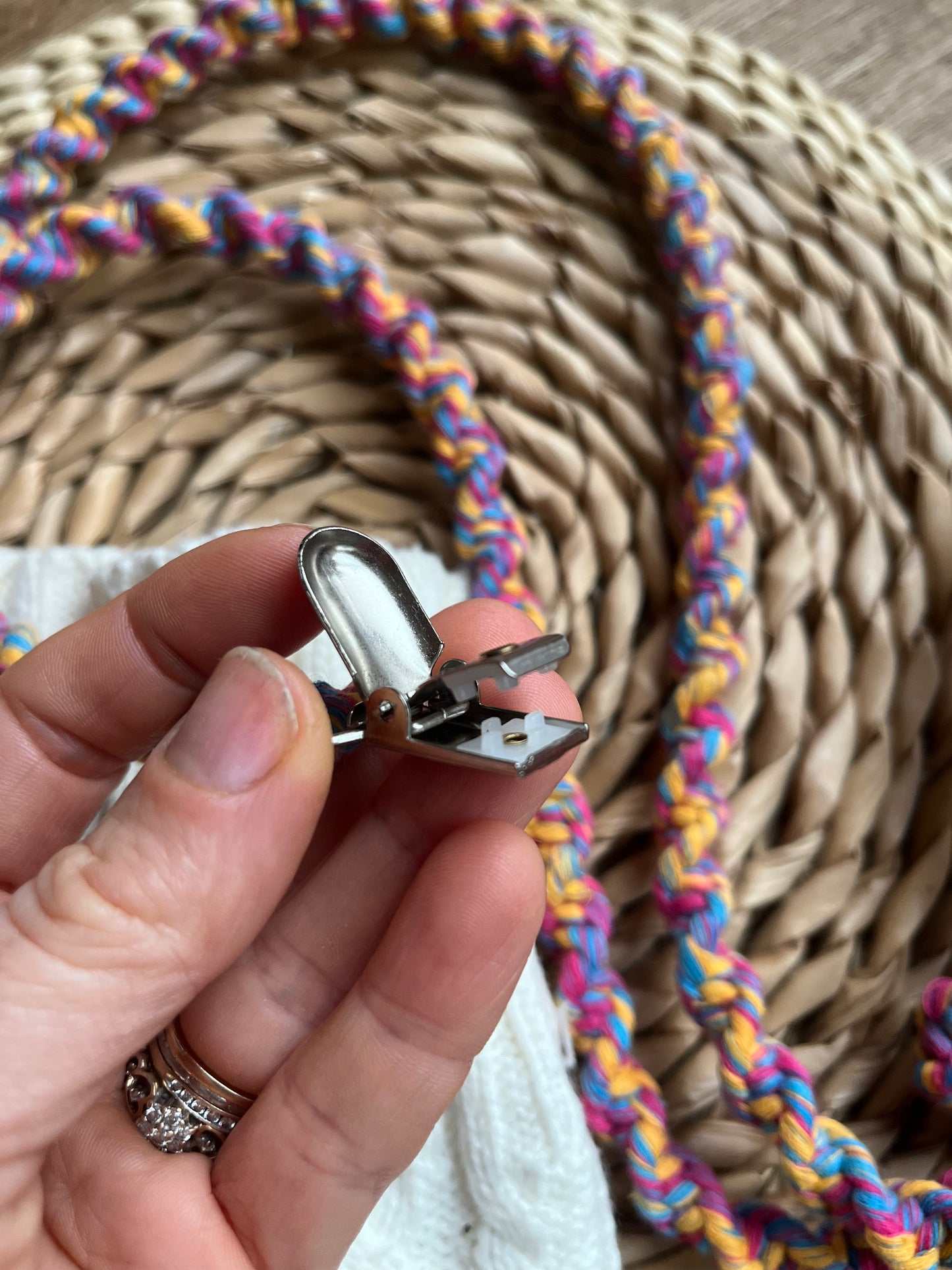 Detailed view of crocodile clip on handmade eco-friendly long mitten clips - secure fastening for winter mittens and gloves