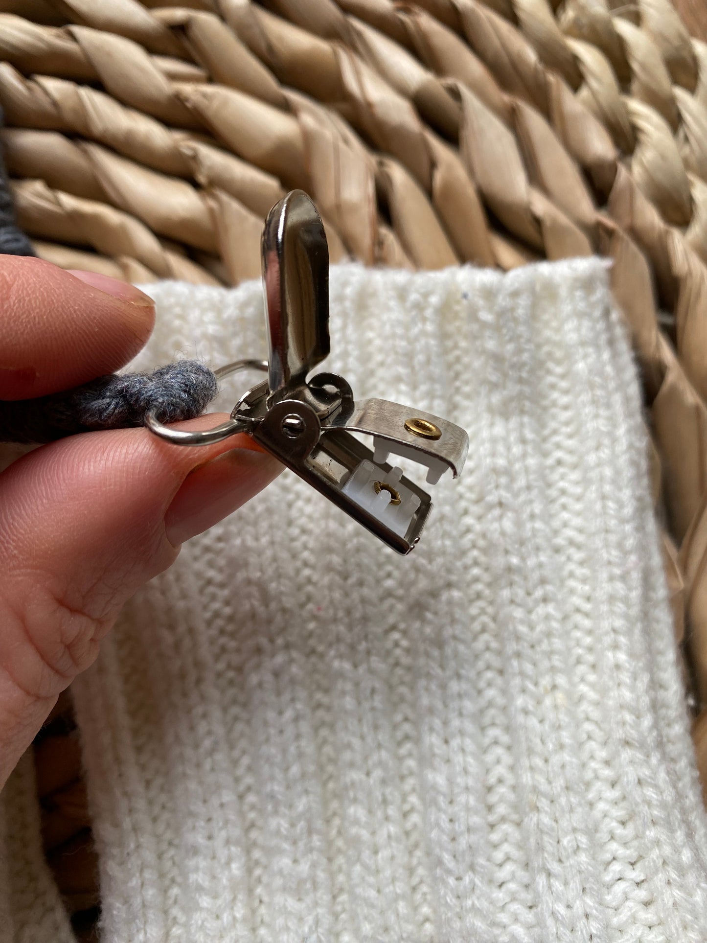 Detailed view of crocodile clip on handmade eco-friendly long mitten clips - secure fastening for winter mittens and gloves