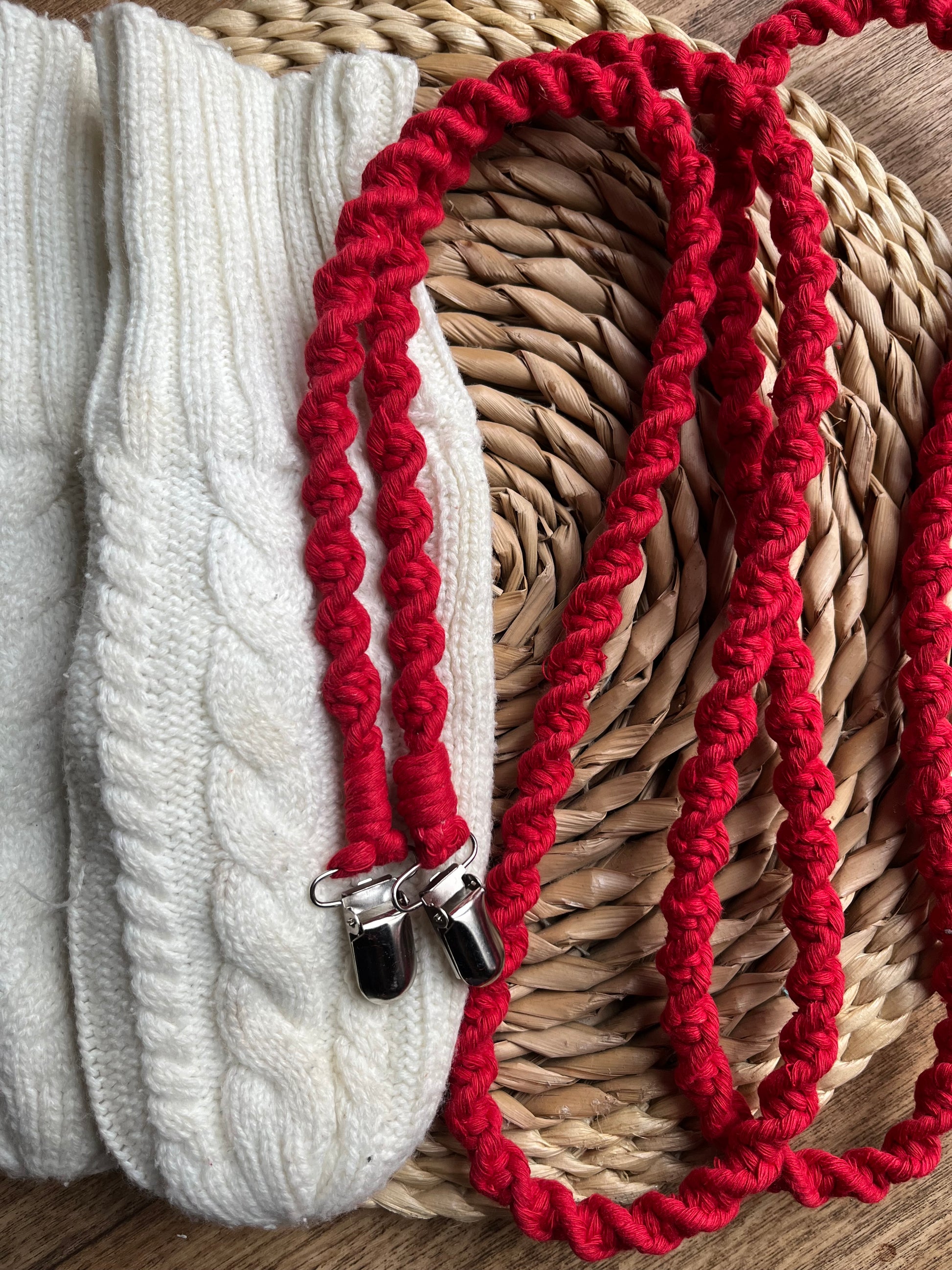 Bright red eco-friendly long mitten clips laid flat on mittens - 190cm handmade winter accessory by Macra-Made With Love