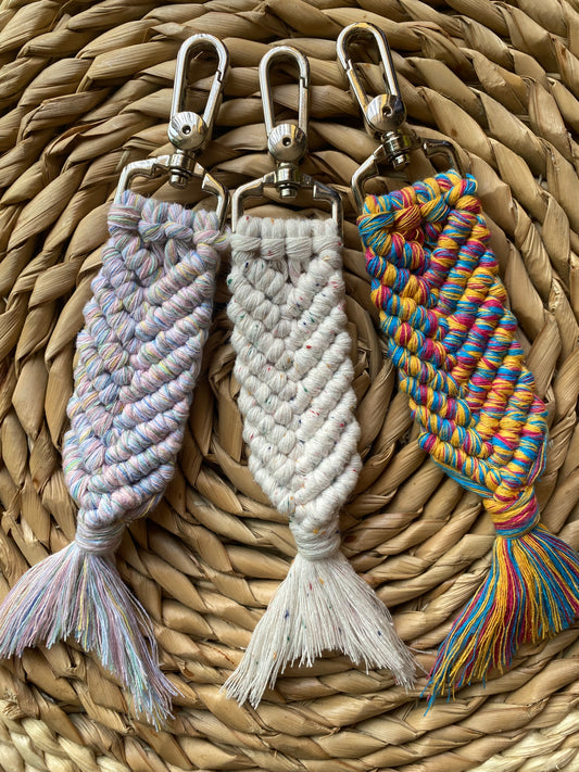Macra-Made With Love keychains, handmade in the shape of a mermaids tail, using recycled cotton in various colours. Finished with a strong silver coloured metal lobster clasp on one end.