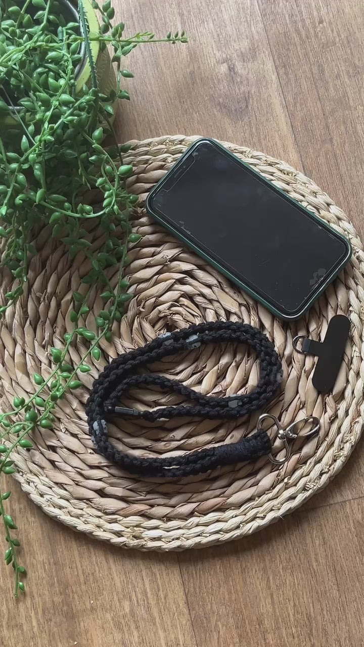 Video demonstrating how to use a macrame phone holder lanyard with universal tether