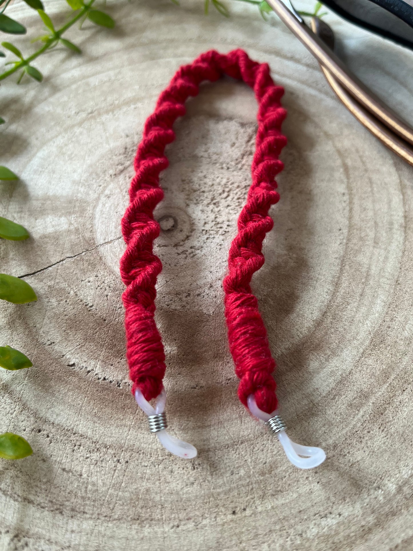 Handmade macrame strap for glasses, made with red recycled cotton