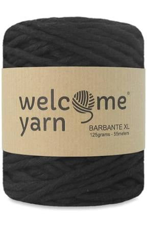Stock image of a skein of black recycled cotton yarn.