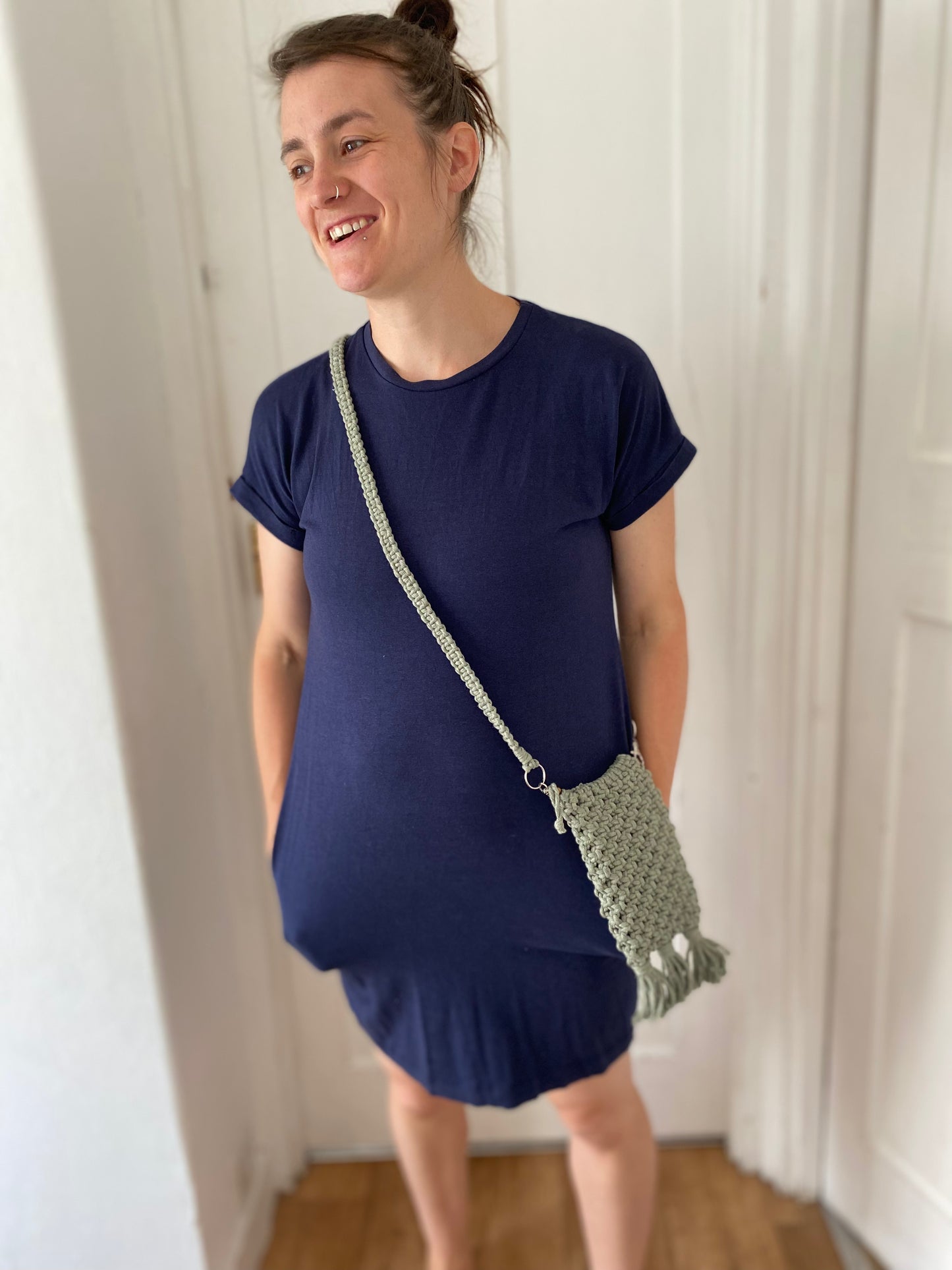 Macra-Made With Love phone bag sage being worn inside front