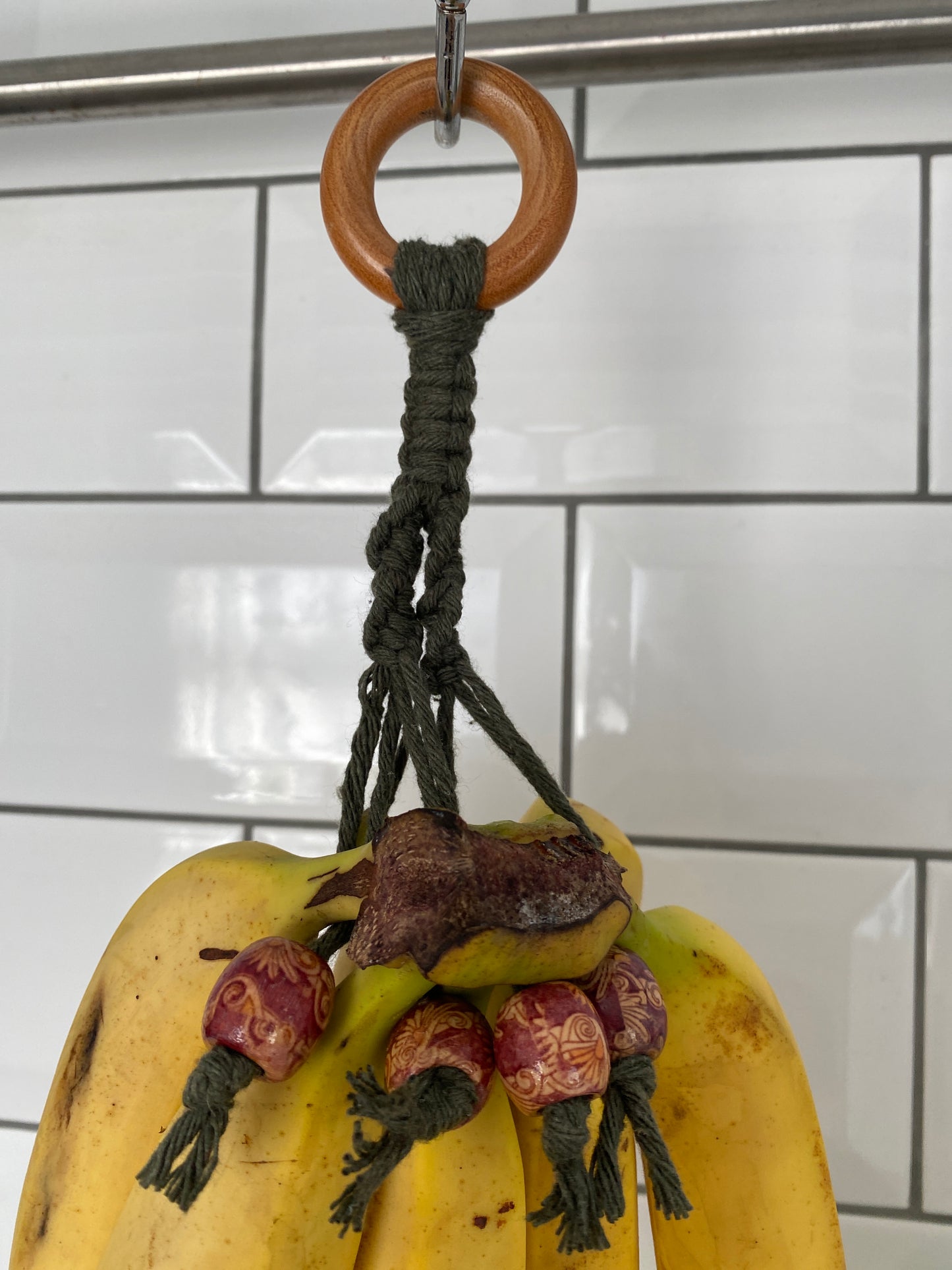 Banana hanger kitchen decor green patterned close