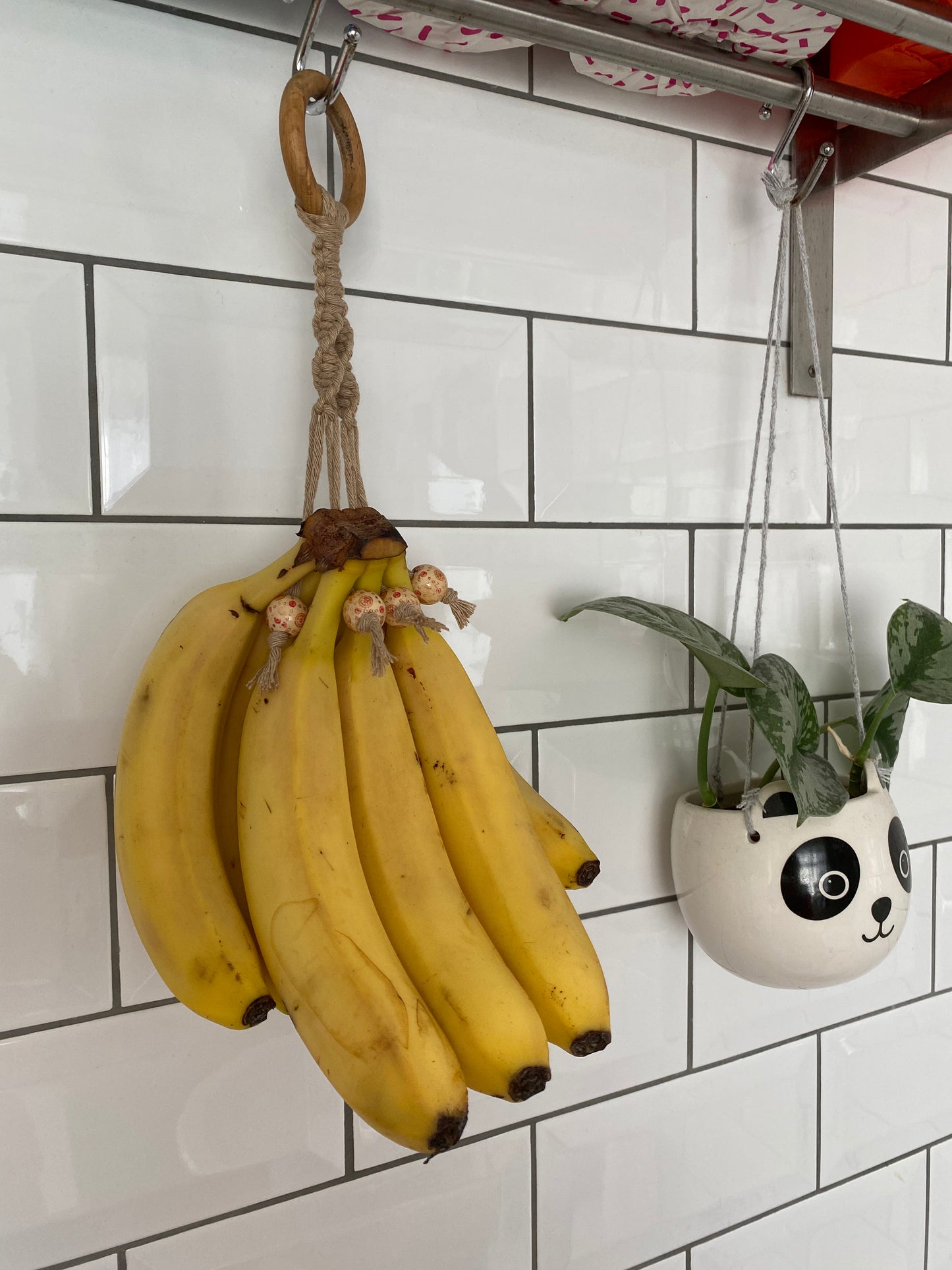 Banana hanger kitchen decor taupe patterned focus