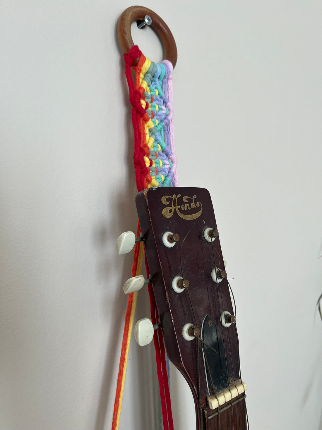 Add a Splash of Colour and Functionality with a Macrame Guitar Hanger