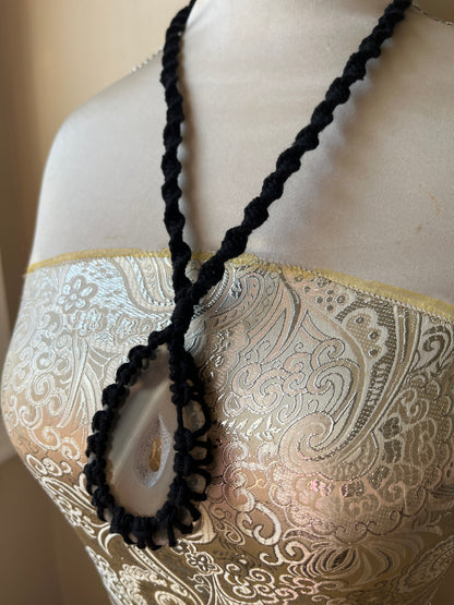 Black necklace with natural agate slice on mannequin - side view 