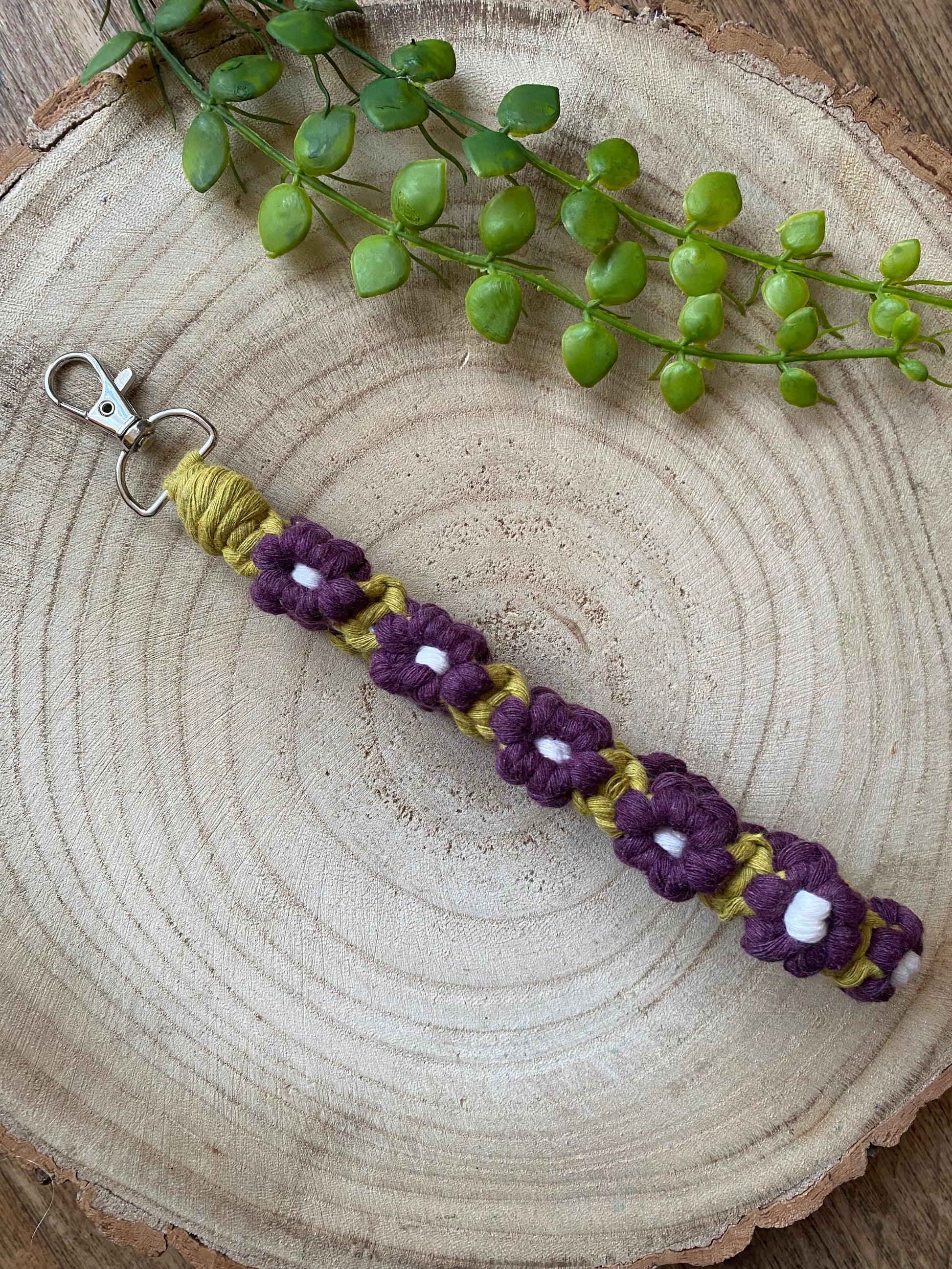 Purple floral macrame wristlet handmade using eco friendly recycled cotton