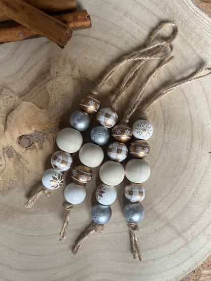 Decorative beads with patterns on a wooden surface