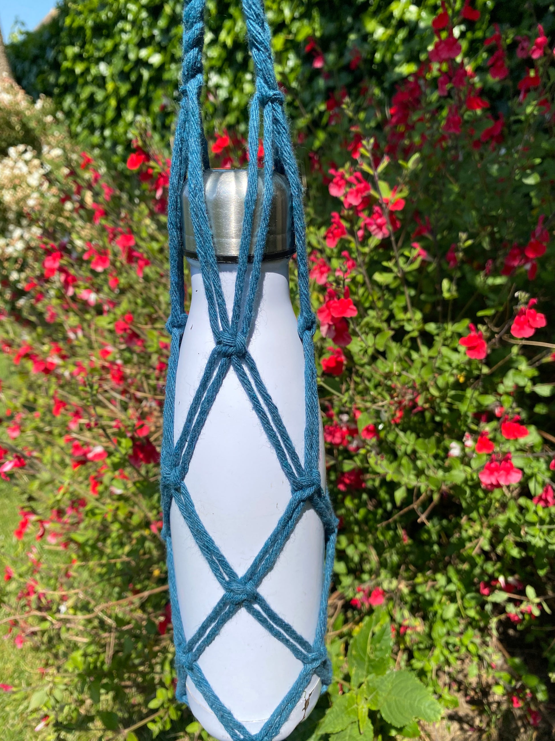 Made by Minga  Woven Water Bottle Holder with Leather Strap