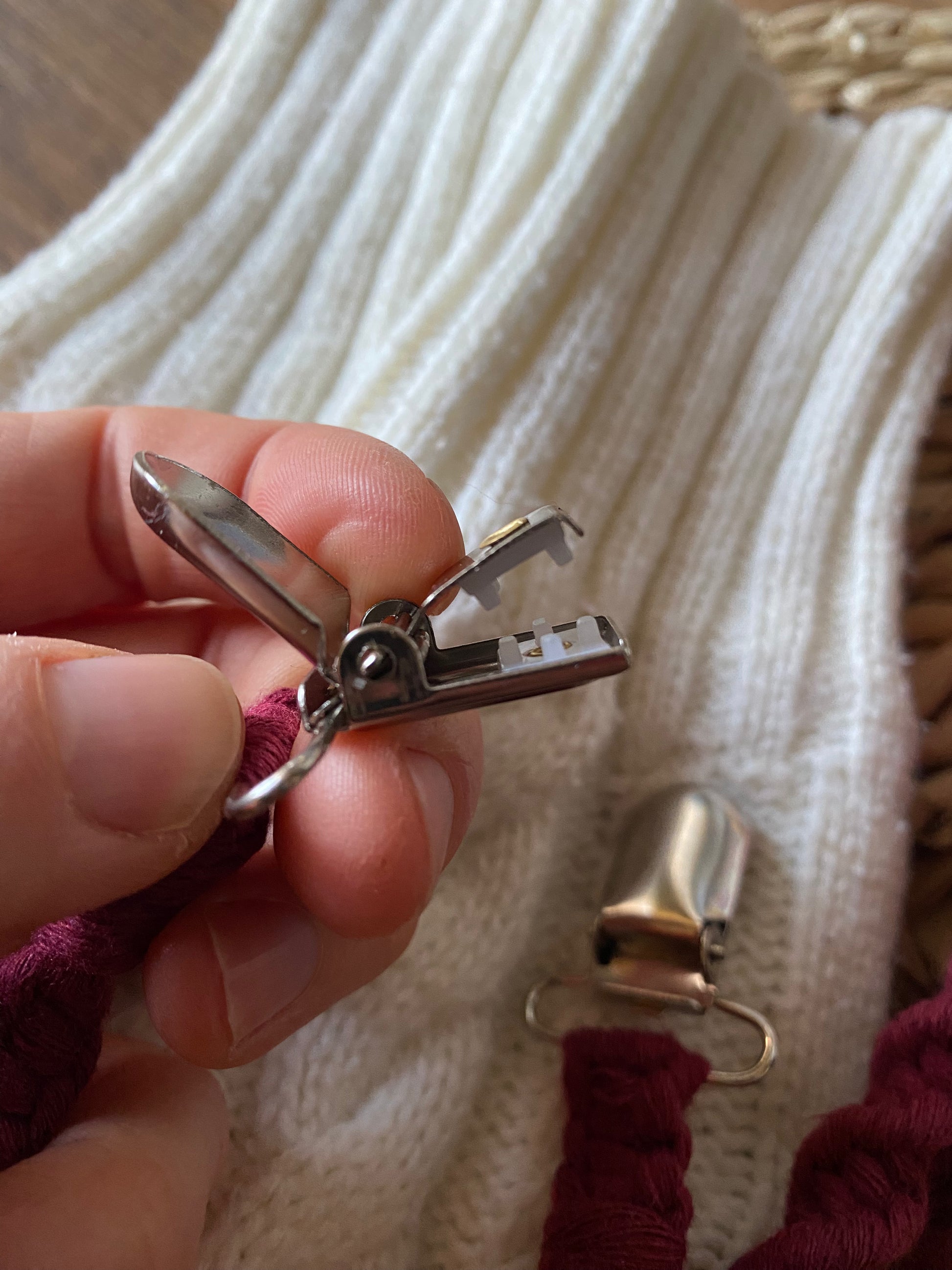 Detailed view of crocodile clip on handmade eco-friendly long mitten clips - secure fastening for winter mittens and gloves