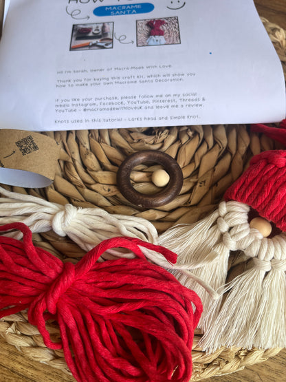 Gnome craft project with yarn, wooden ring, and instructions on a woven mat.