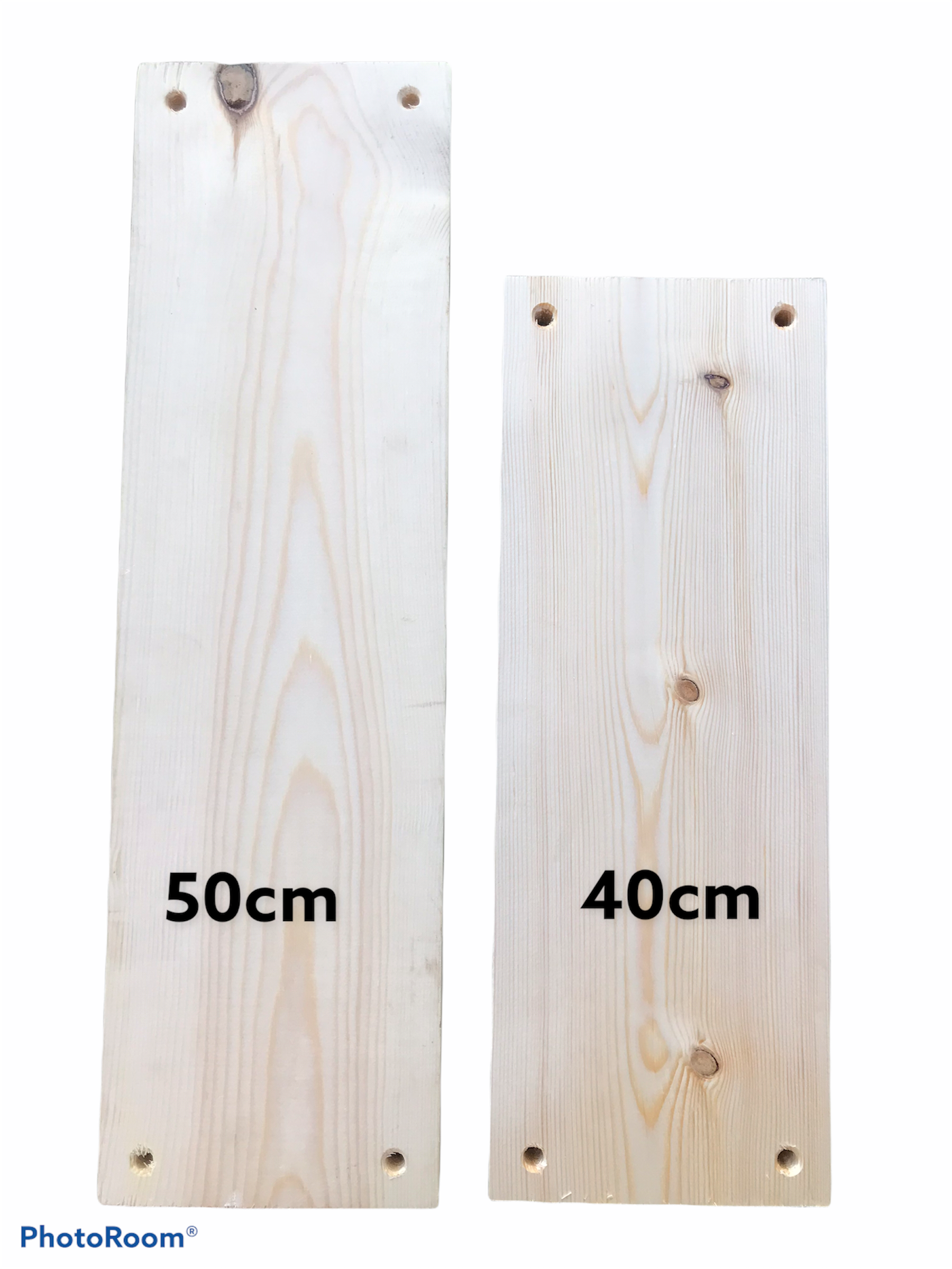 Image showing two pieces of pale coloured solid wood next to each other. There is black text of "50cm" and "40cm" on the image, indicating the length of the wood. 