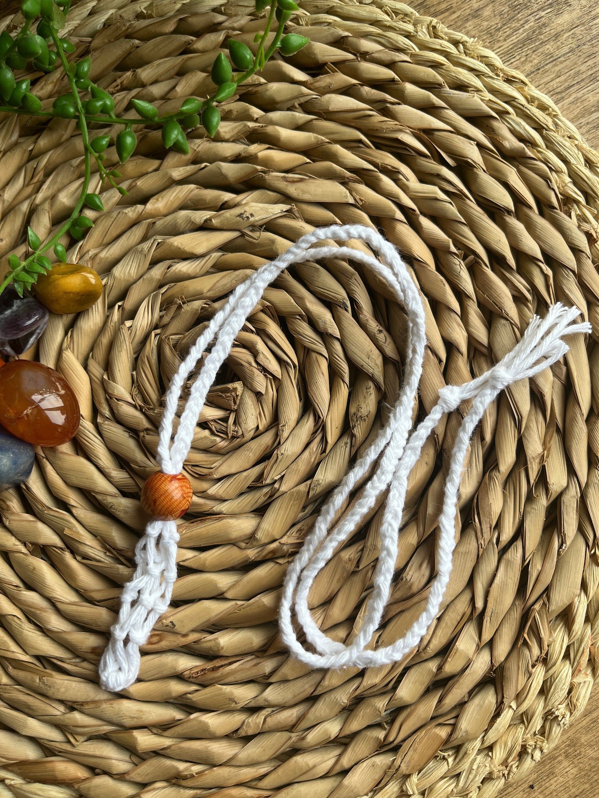 Macrame Gemstone Holder empty net pouch made with white eco friendly recycled cotton and a Wooden bead