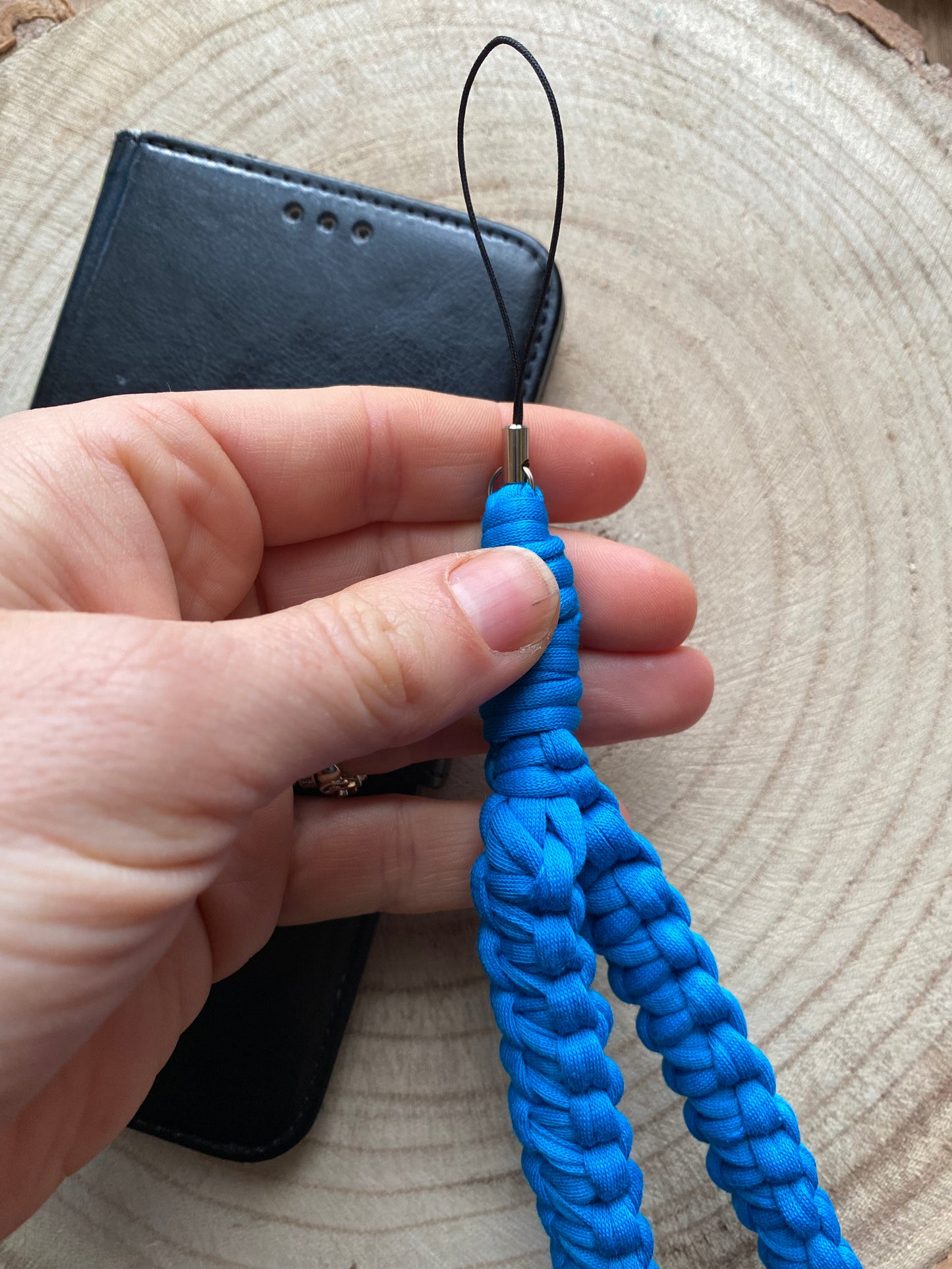 Macra-Made With Love phone charm blue t shirt yarn close in hand 